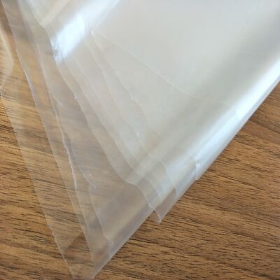 0.015mm Süper ince yumuşak su geçirmez TPU Film Polyurethane yağmur giyimleri ve tıbbi yataklar için plastik levha